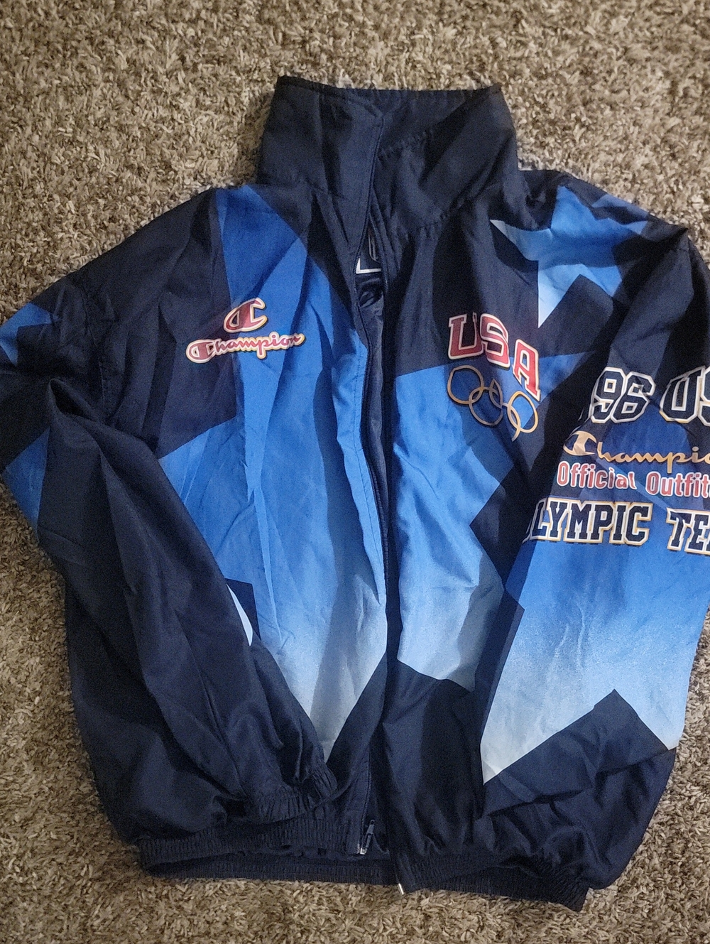 Vintage 1996 Champion USA Olympic Team windbreaker featuring star graphics